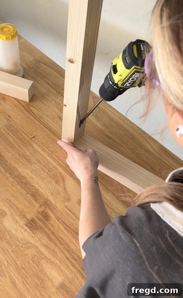 Craft Your Seven-Board Coffee Table 6 Assembling the coffee table apron frame using wood glue and Kreg pocket hole screws for strong joints.
