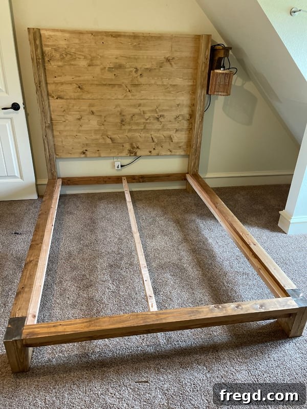 Craft Your Sleep Haven: DIY Bed Frame and Timber Headboard 18 Installing bed slats