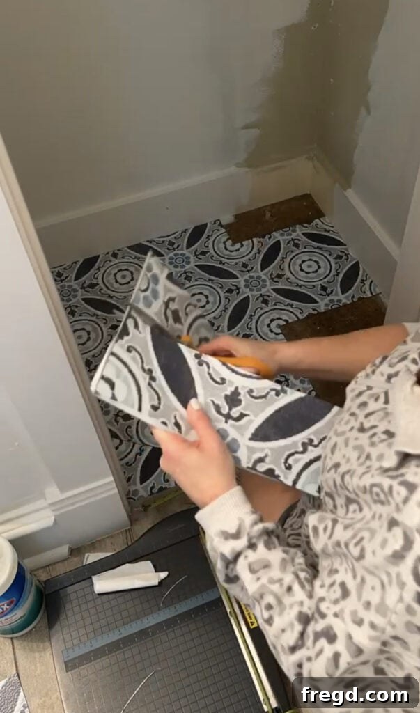 Installing peel and stick vinyl tile flooring in the cleaning closet
