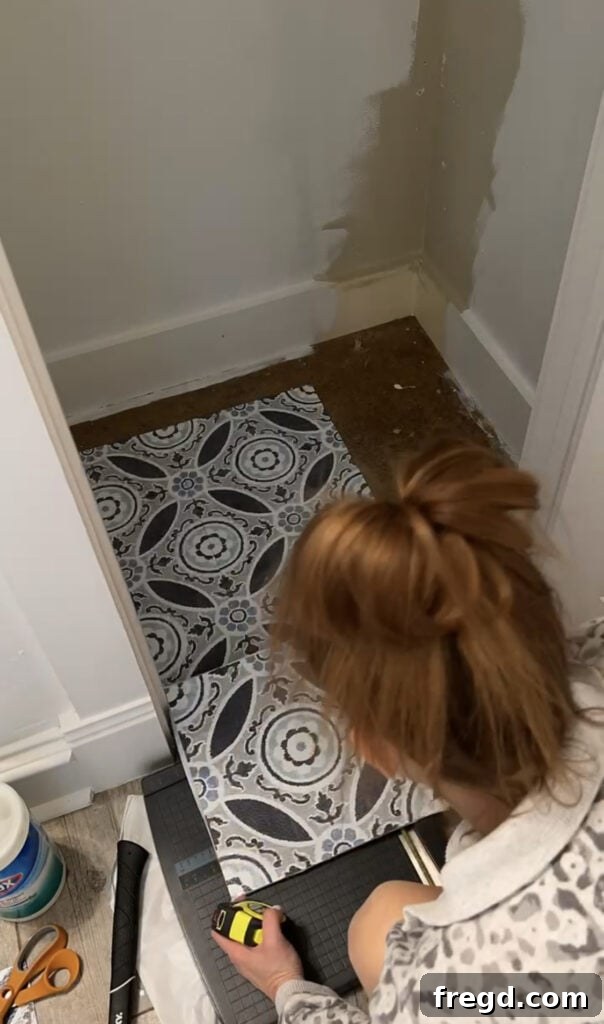 Close-up of newly installed patterned peel and stick floor in a clean utility closet