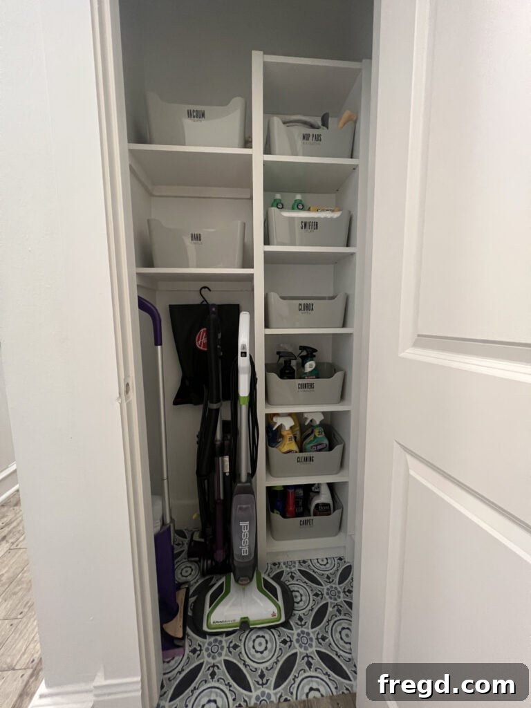 View of the completed and fully organized DIY cleaning supply closet
