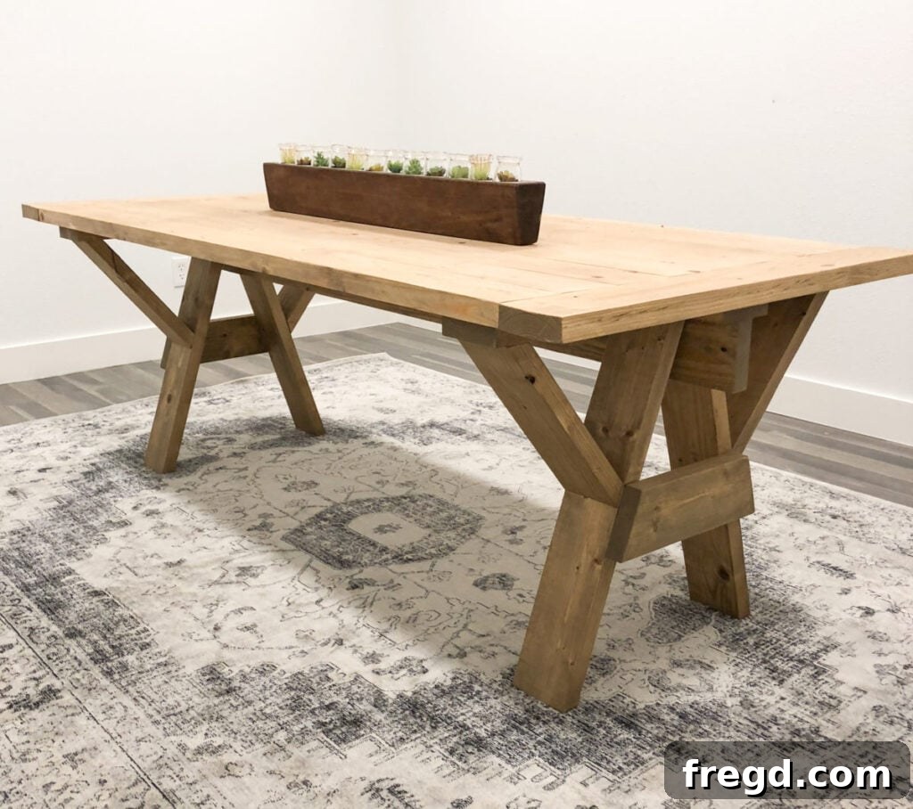 DIY Sawhorse Base Farmhouse Dining Table in a studio break room