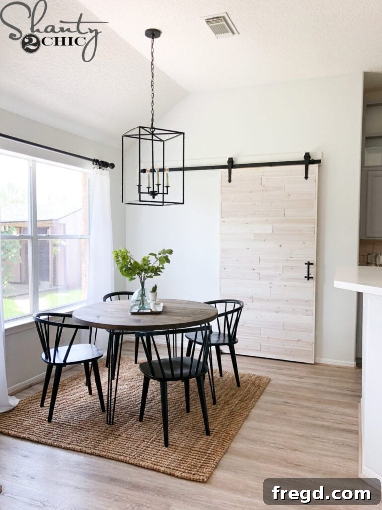Round Dining Table with Hairpin Legs and a light wood stain