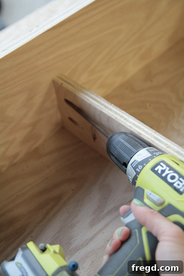 Craft Your Own Miter Saw Station 17 Shelf supports attached to back fence
