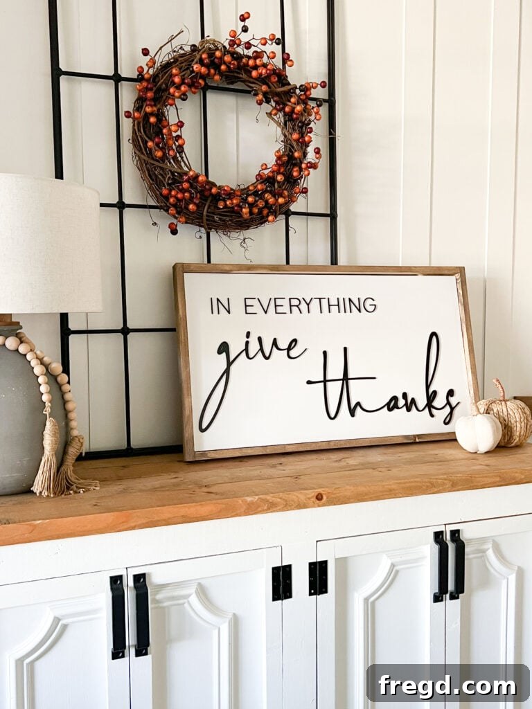 Close-up of the elegant lettering on the DIY wood sign