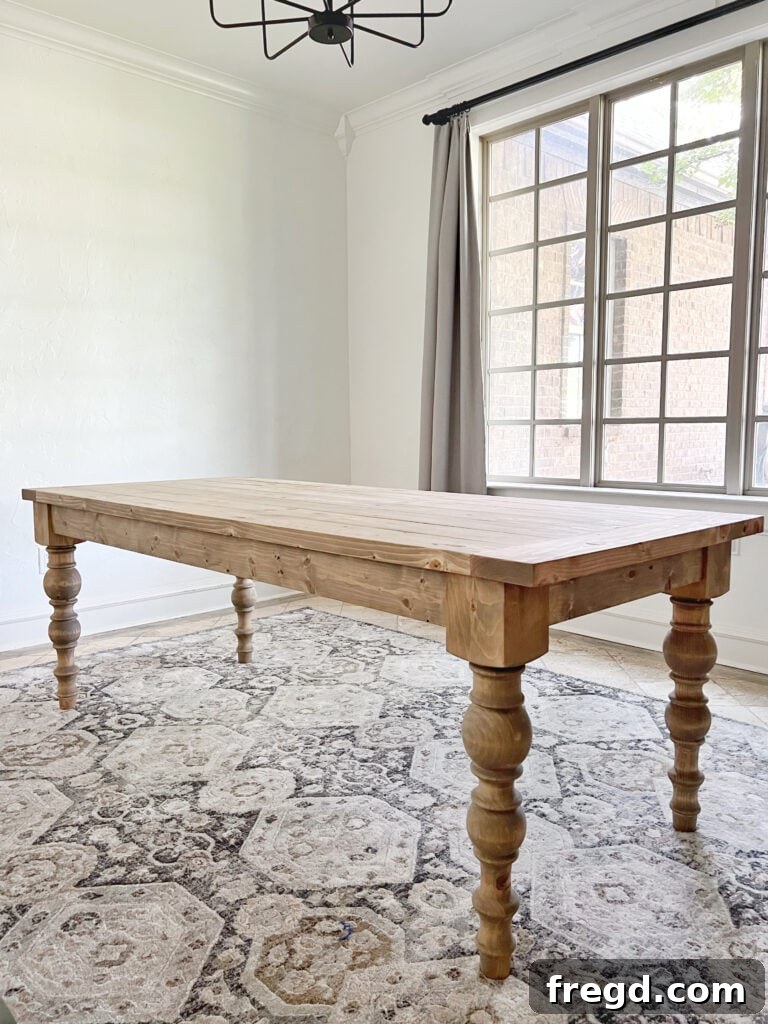 Handcrafted Farmhouse Dining Table with Elegant Turned Legs 3 Close-up of the modern farmhouse turned leg dining table showing details