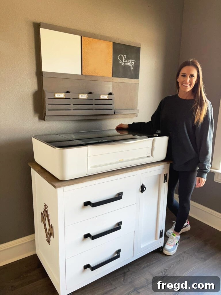 Custom-built craft cabinet designed to neatly house a Glowforge laser cutter and its air filter.