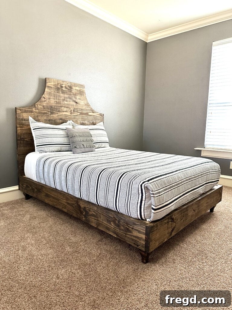 Beautifully crafted DIY full size bed with an elegant, fancy headboard