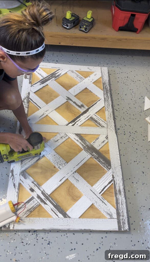 Short diagonal pieces of wood being precisely measured and attached to fill gaps in the parquet design, enhancing its geometric pattern.