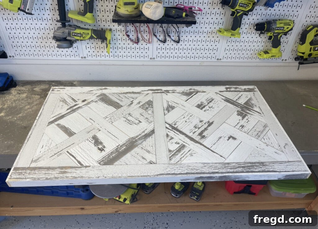 The completed coffee table top showcasing the intricate parquet design framed by elegant trim.