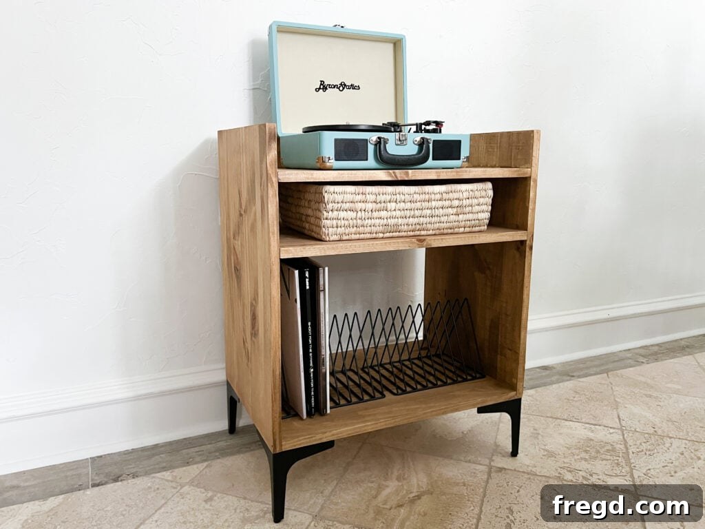 Craft Your Own Vinyl Listening Station 12 The fully assembled and accessorized DIY record player stand in a room setting