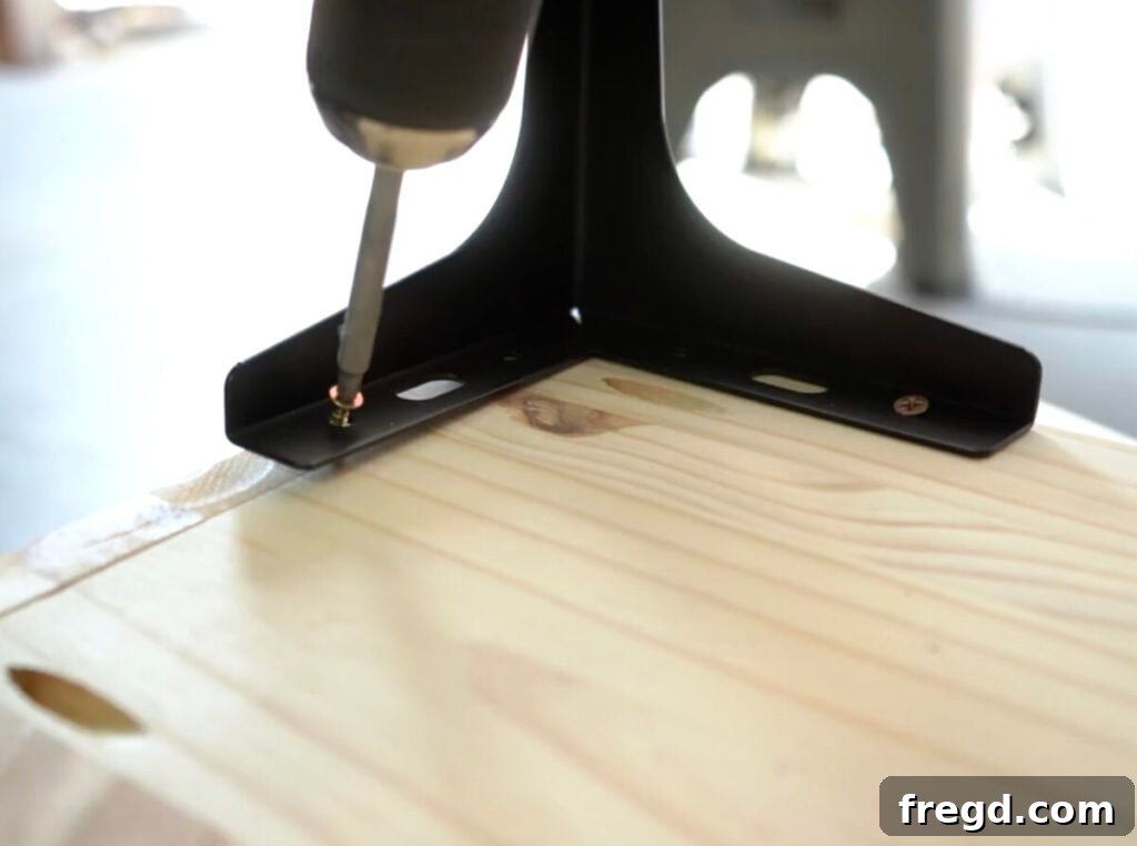 Craft Your Own Vinyl Listening Station 10 Close-up of one of the industrial-style feet on the record player stand