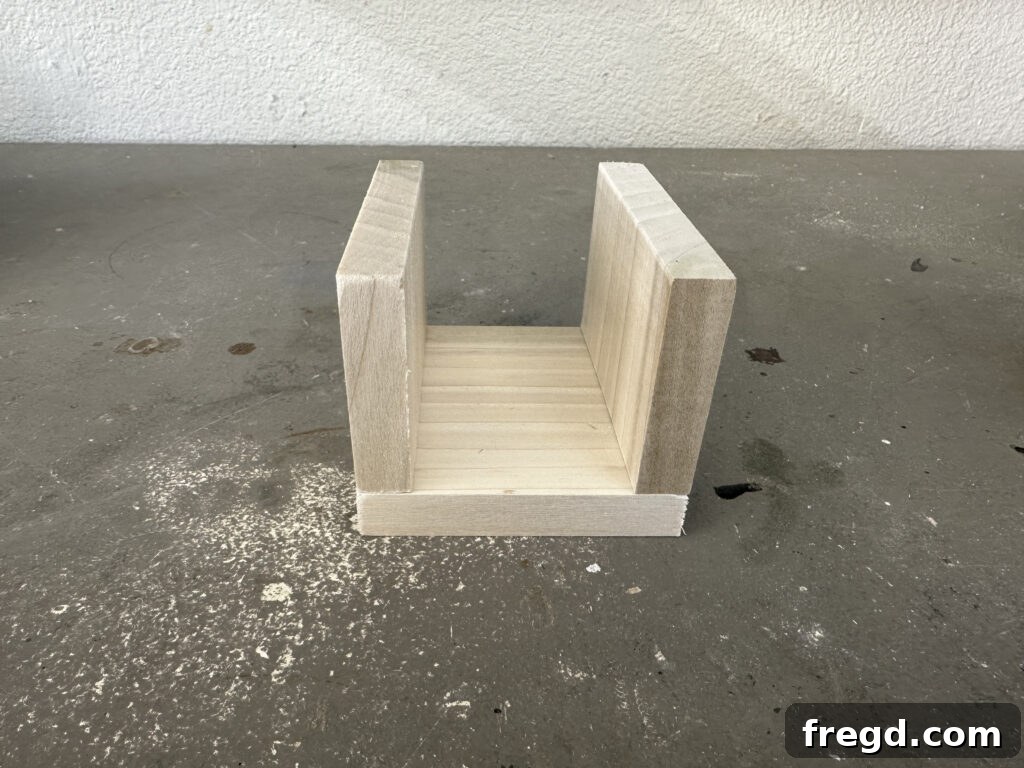 Craft Your Custom Countertop Spice Organizer 3 Wood pieces cut to size, showing the first end section being assembled.