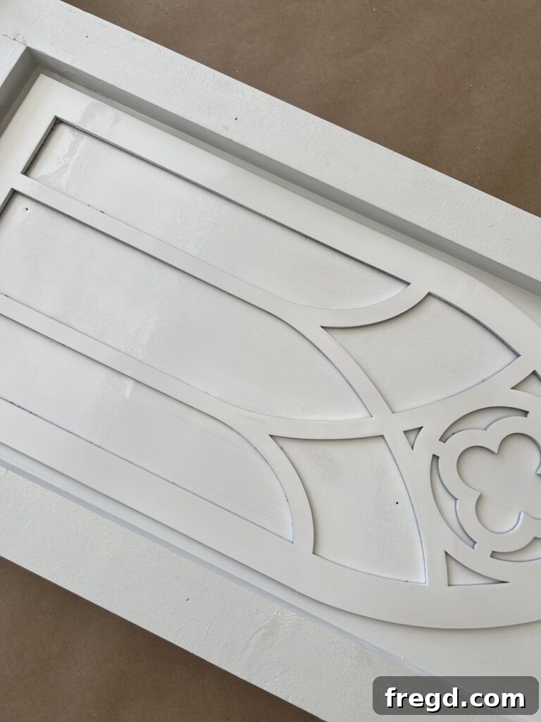 Build Your Own Elegant Buffet Table 24 Close-up of the buffet table doors and cabinet base, meticulously painted in Sherwin-Williams Pure White with a smooth satin finish.