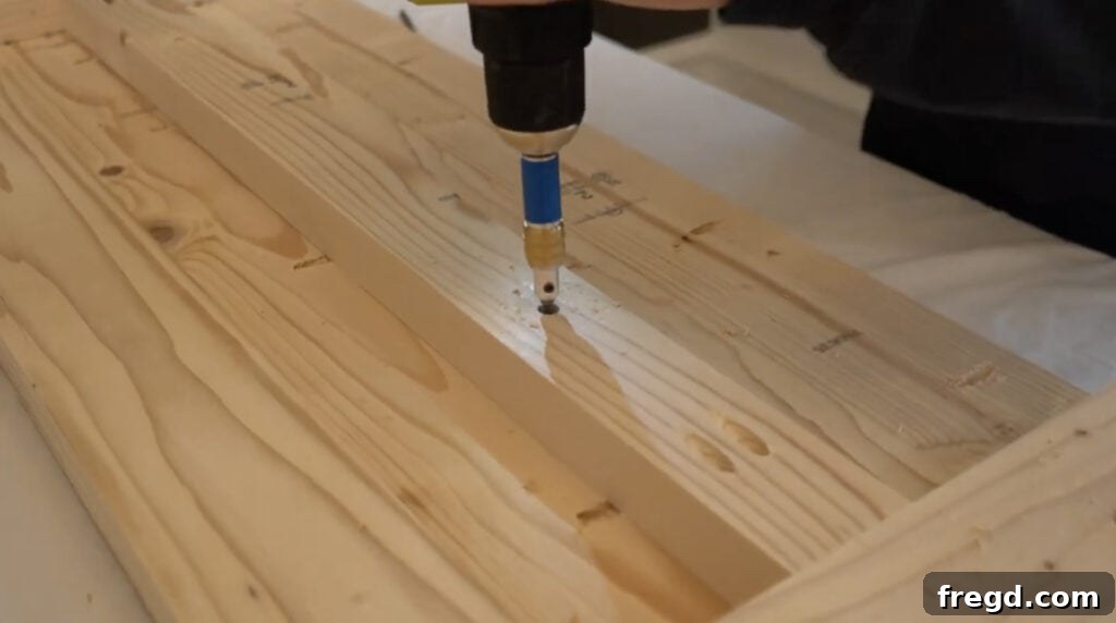 Close-up detail of wood screw attachment for top leg supports.
