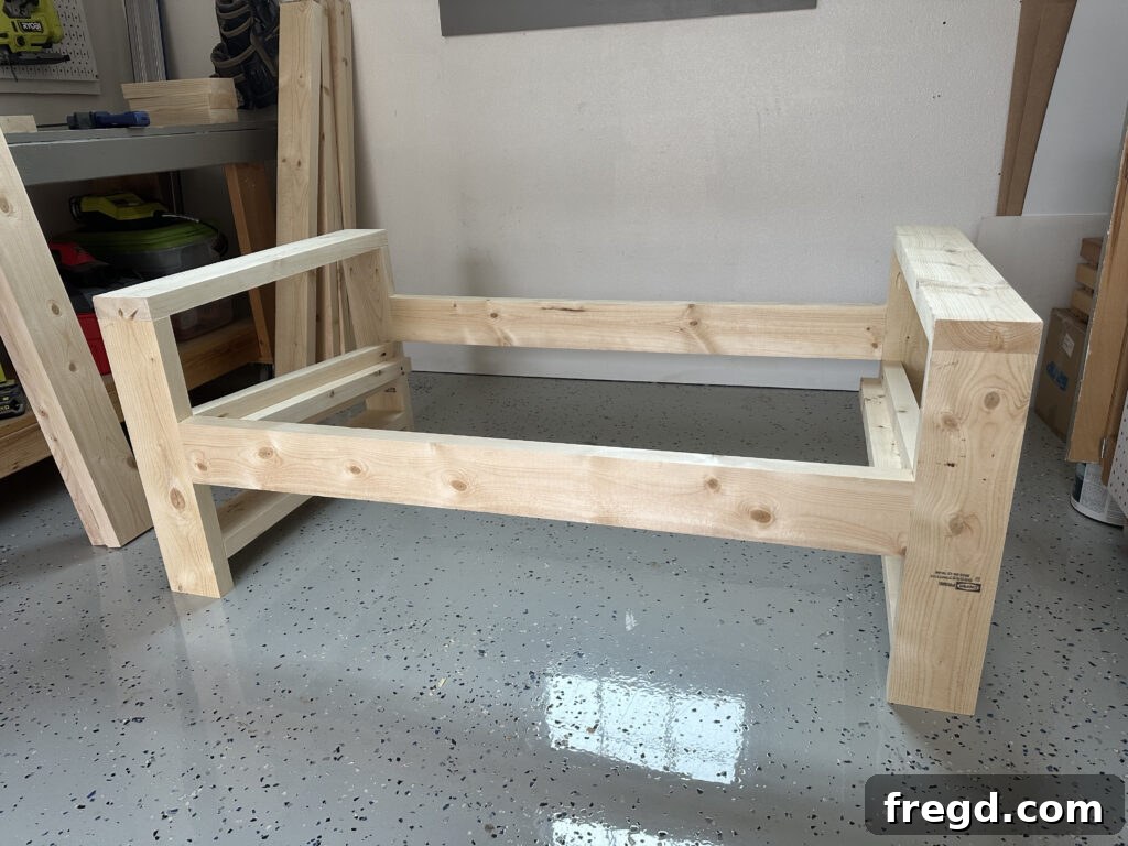 Connecting the second arm assembly to the front and back runners