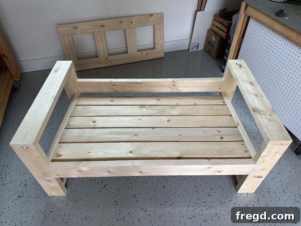 Close-up of seat slat attachment showing screws and spacing