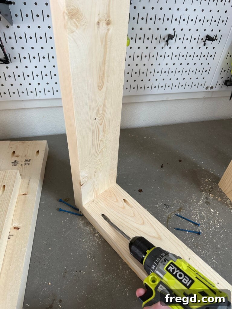 Close-up detail of pocket hole joint on an arm assembly piece