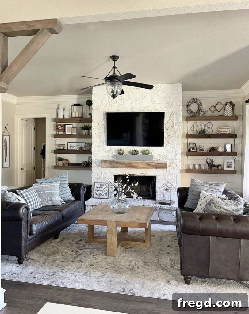 A stylish living room featuring a comfortable Lovesac Sactional in a light neutral color, positioned invitingly in front of a fireplace.