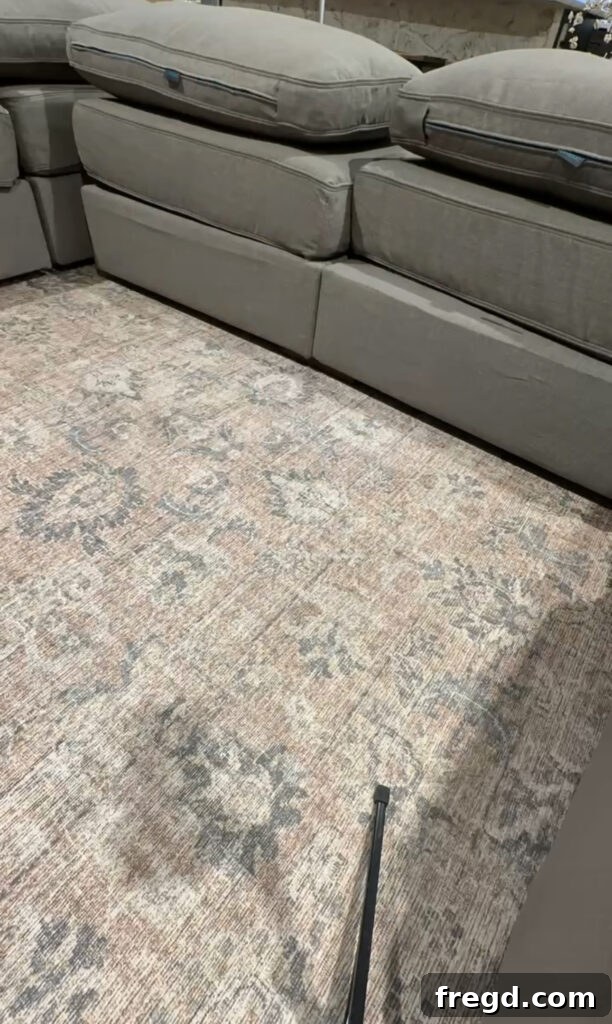 Lovesac Sactional base pieces laid out on the floor, forming the initial shape of the sectional, prior to final assembly.