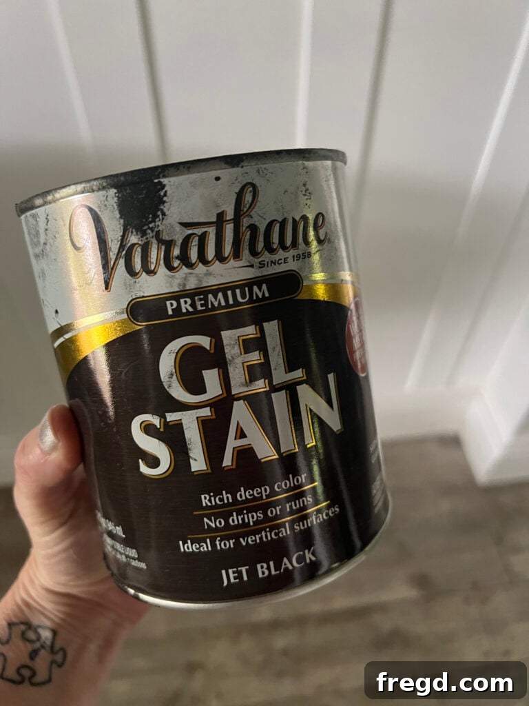 Applying Varathane gel stain in Jet Black to a stair tread.
