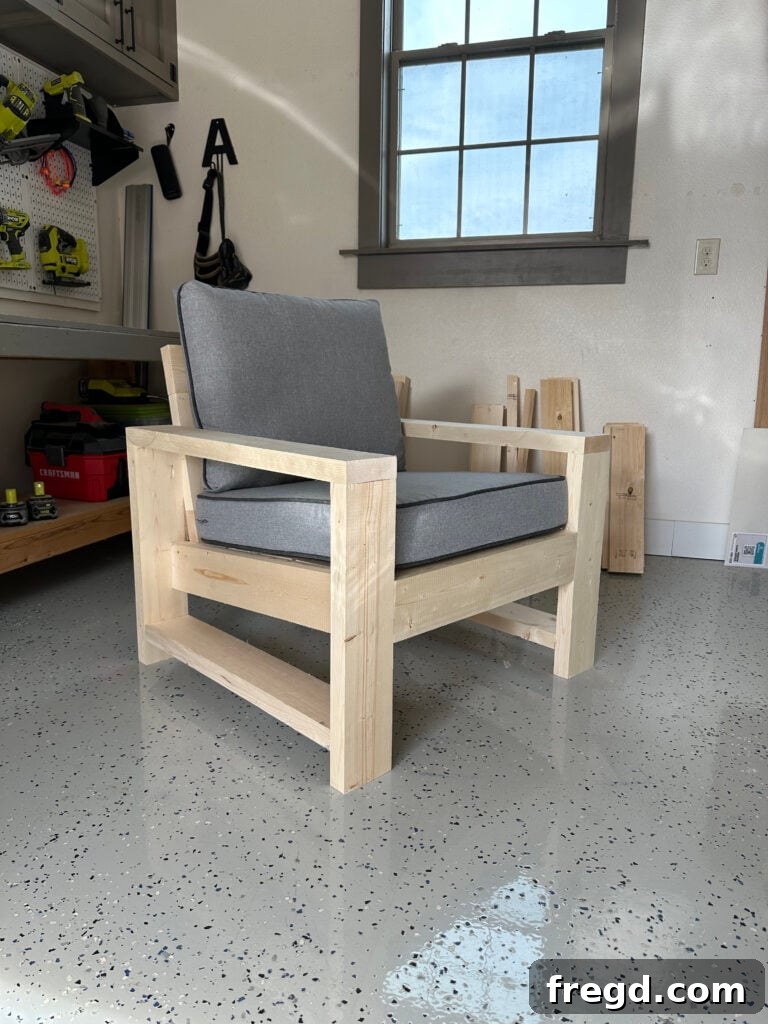 Outdoor chair ready for finishing touches, with cushions test-fitted for size.