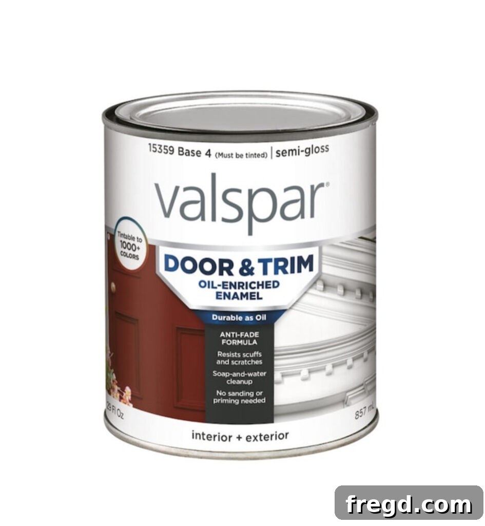Applying an indoor/outdoor paint in Urbane Bronze to finish the DIY outdoor chair.
