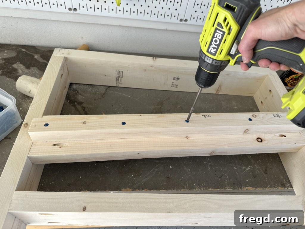 Attaching the cleats to the side slat support of the outdoor chair, which will hold the seat slats.