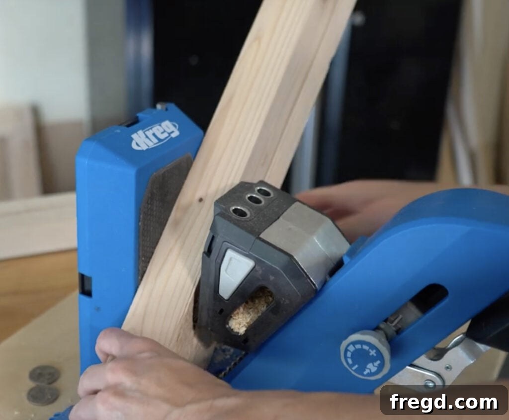 Drilling 1.5-inch pocket holes into frame pieces with a Kreg Jig