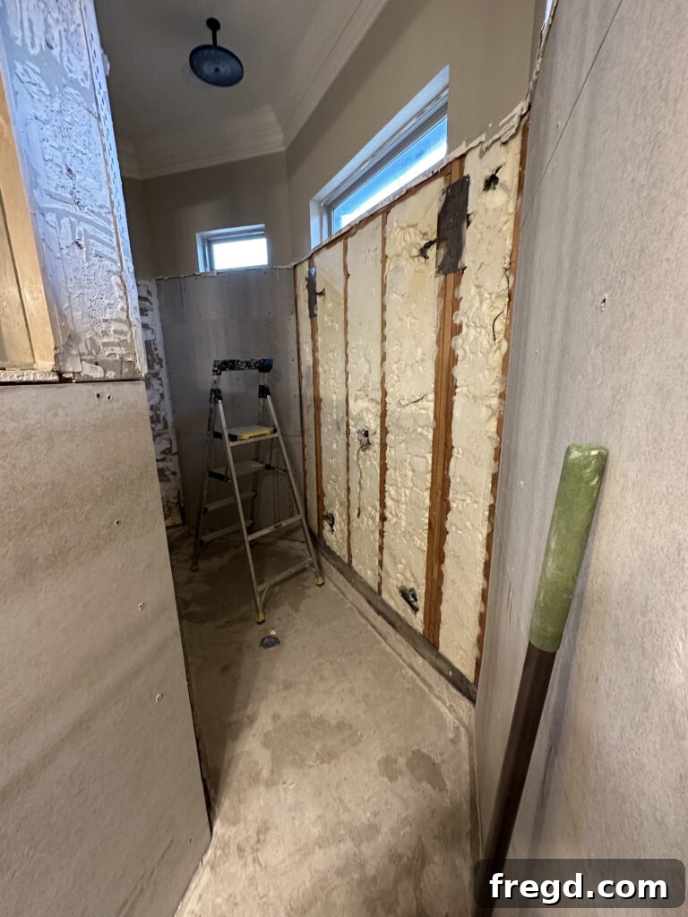 Master Bath Oasis Reimagined 12 Demolition in progress in master bathroom.