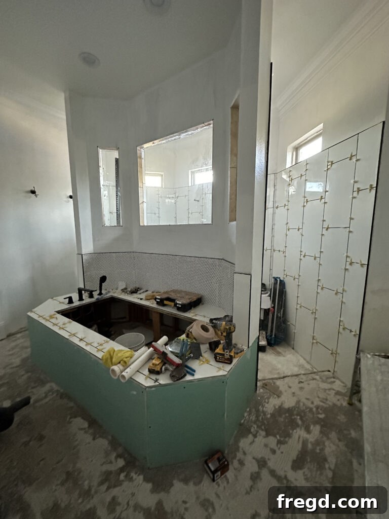 Master Bath Oasis Reimagined 14 New tile installation in master bathroom shower.