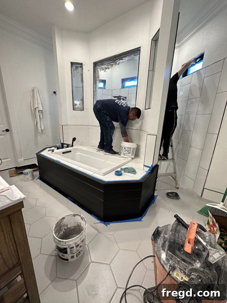 Master Bath Oasis Reimagined 21 Tub skirt painted Tricorn Black by Sherwin Williams.