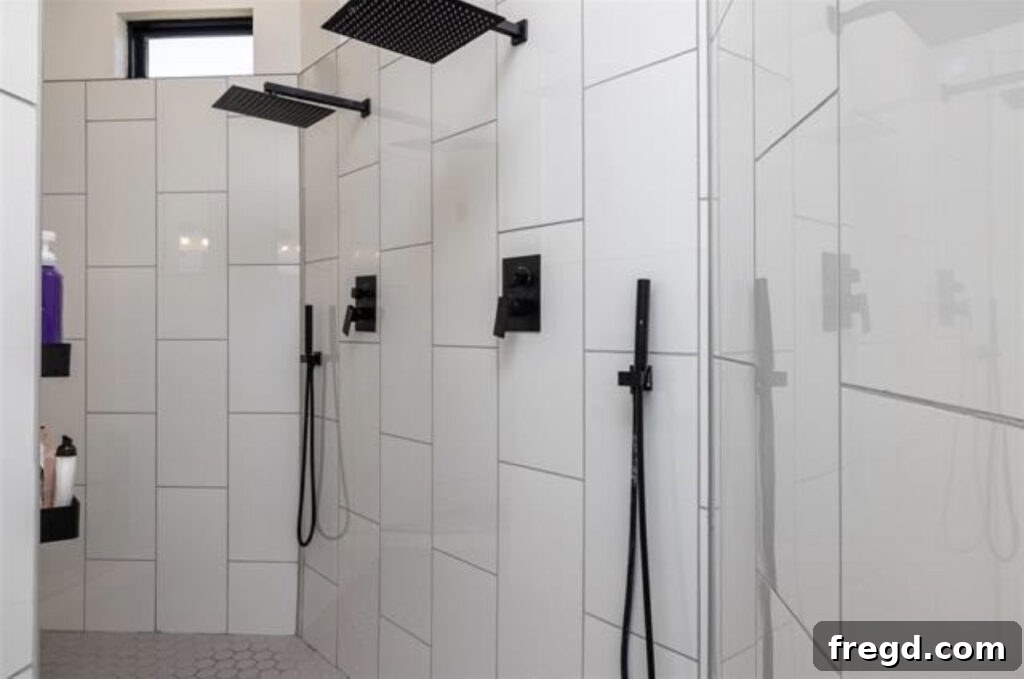 Master Bath Oasis Reimagined 25 Revealed master bathroom shower with rain shower heads.