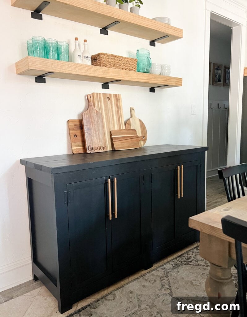 Craft Your Own Modern Farmhouse Sideboard 2 A beautifully finished DIY Modern Farmhouse Sideboard in a dining room setting, ready for holiday decorations.