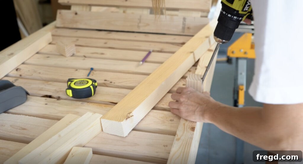 Attaching short arm rest blocks to the top of the lounge chair frame