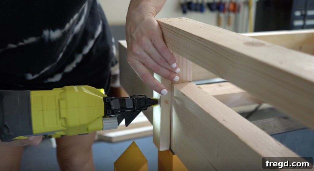 Attaching arm rest trim pieces to conceal pocket holes and enhance aesthetics