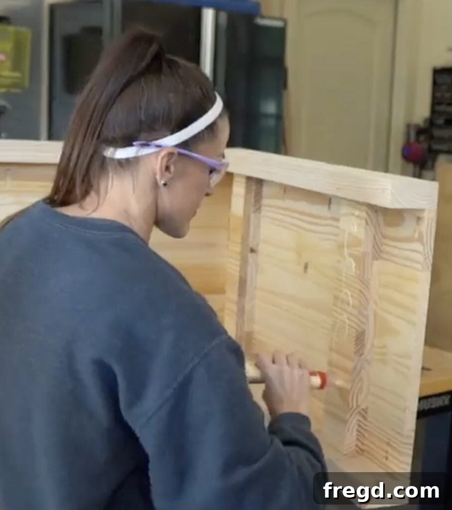 Elegant Waterfall Desk Build 18 Inside panel being attached to hide pocket holes and supports