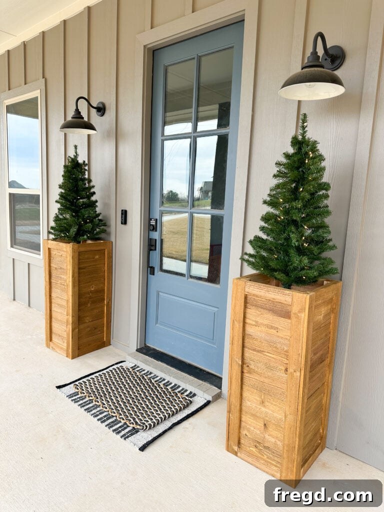 Another view of the DIY cedar planter box, emphasizing its clean lines and sturdy construction on a stylish porch.