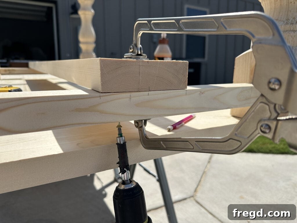 Build Your Own Dining Table with Free DIY Plans 12 Attaching the main runner to the runner supports from below