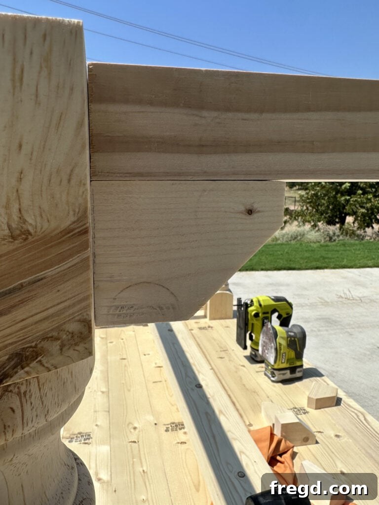 Build Your Own Dining Table with Free DIY Plans 18 Attaching mitered corner pieces to the top corners of the dining table frame