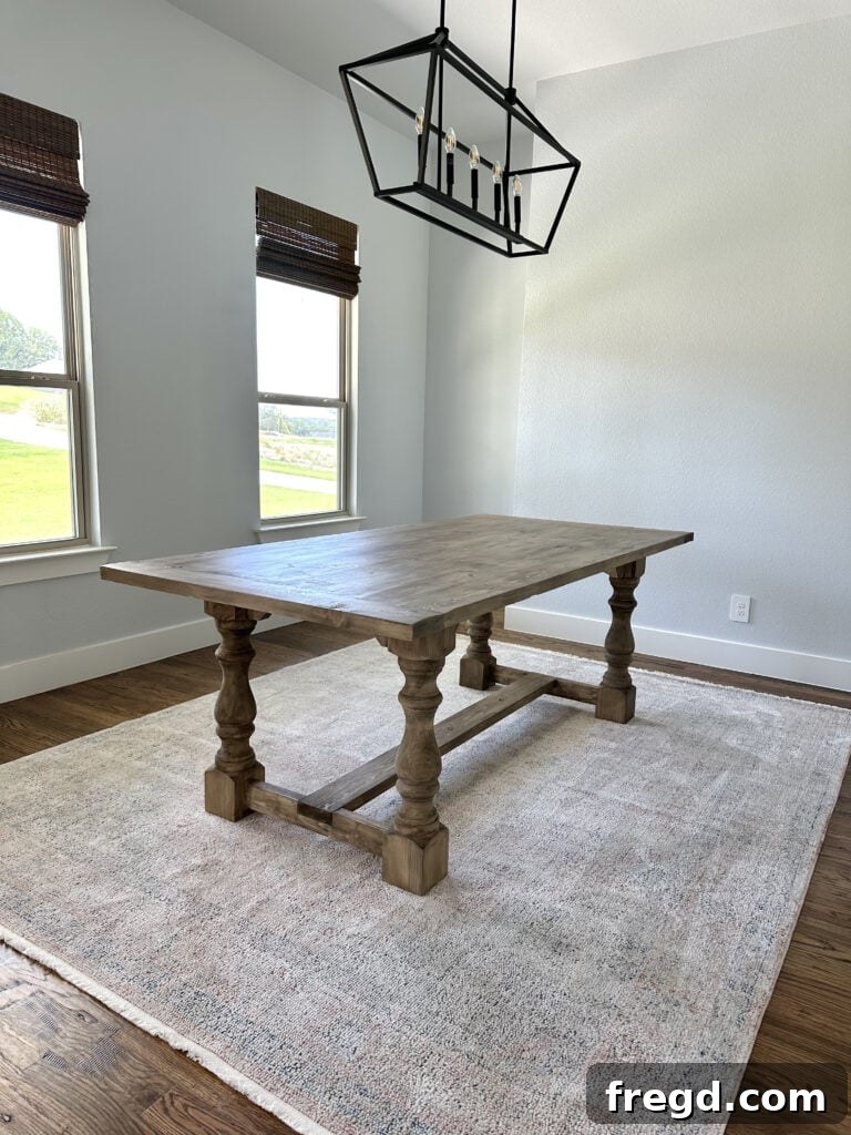 Build Your Own Dining Table with Free DIY Plans 29 Side view of the finished DIY modern refectory dining table