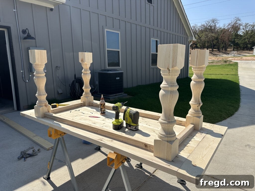 Build Your Own Dining Table with Free DIY Plans 9 Progress shot of the dining table base with all four aprons attached