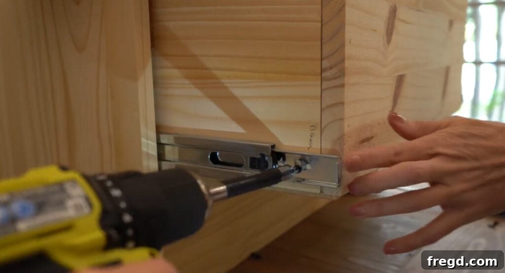 Build Your Own Side Table A Complete Visual Guide 11 Close-up of drawer slide installation on the drawer box