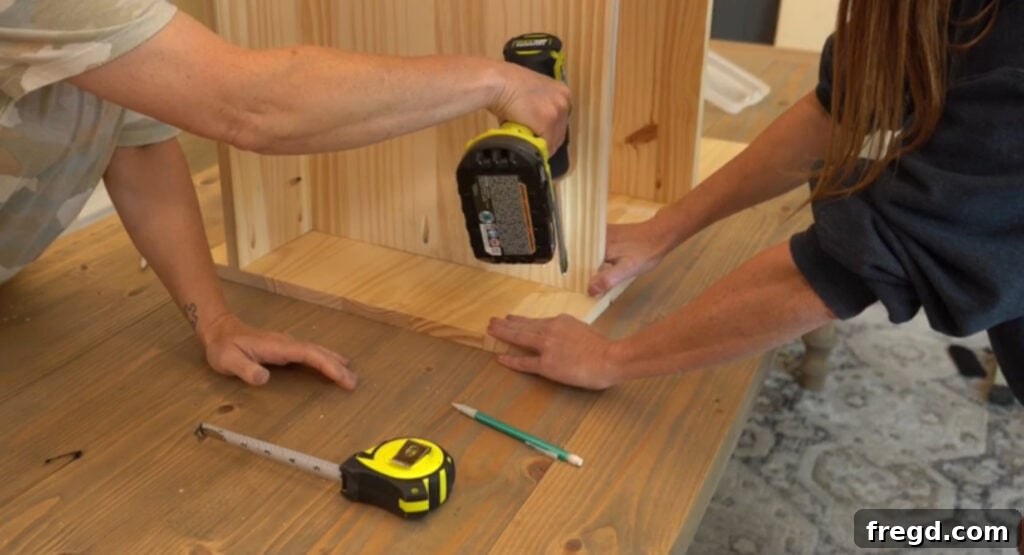 Build Your Own Side Table A Complete Visual Guide 6 Securing the second side panel to the nightstand shelves and toe kick