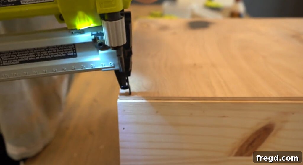 Build Your Own Side Table A Complete Visual Guide 9 Attaching the plywood bottom to the drawer frame