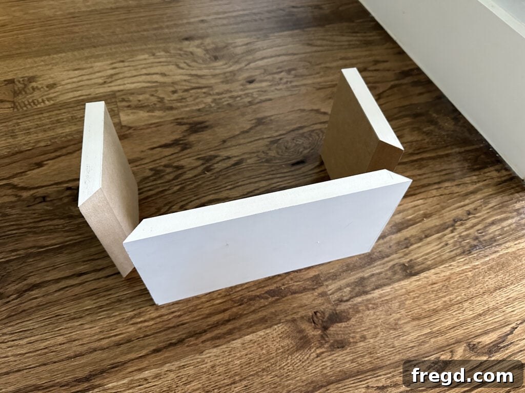 All mitered pieces cut and laid out to form the bottom trim block.