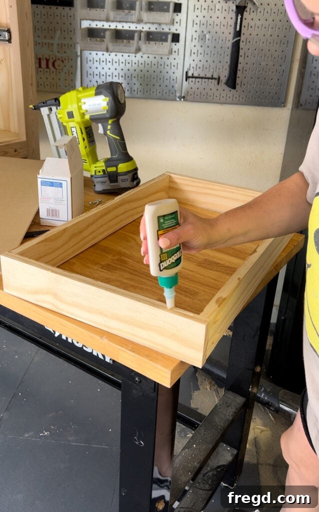 Diagram of Step 7: Attaching drawer base