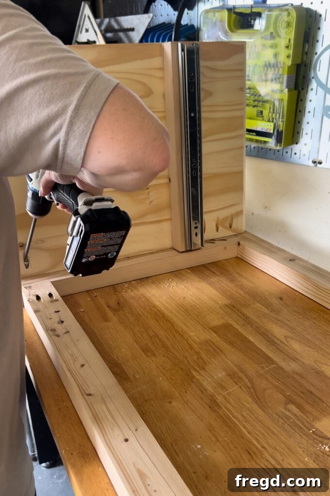 Nightstand assembly showing side panels attached to face frame