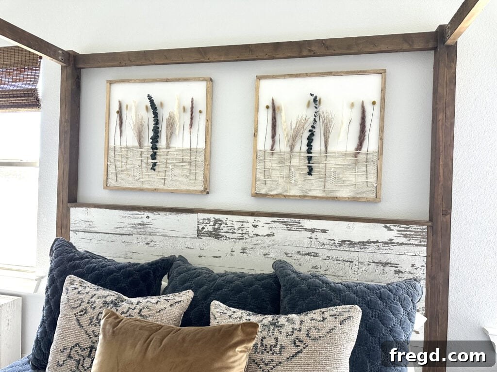 Nature's Eternal Canvas 2 Beautifully arranged dried flowers wall art in a rustic wooden frame, enhancing bedroom decor