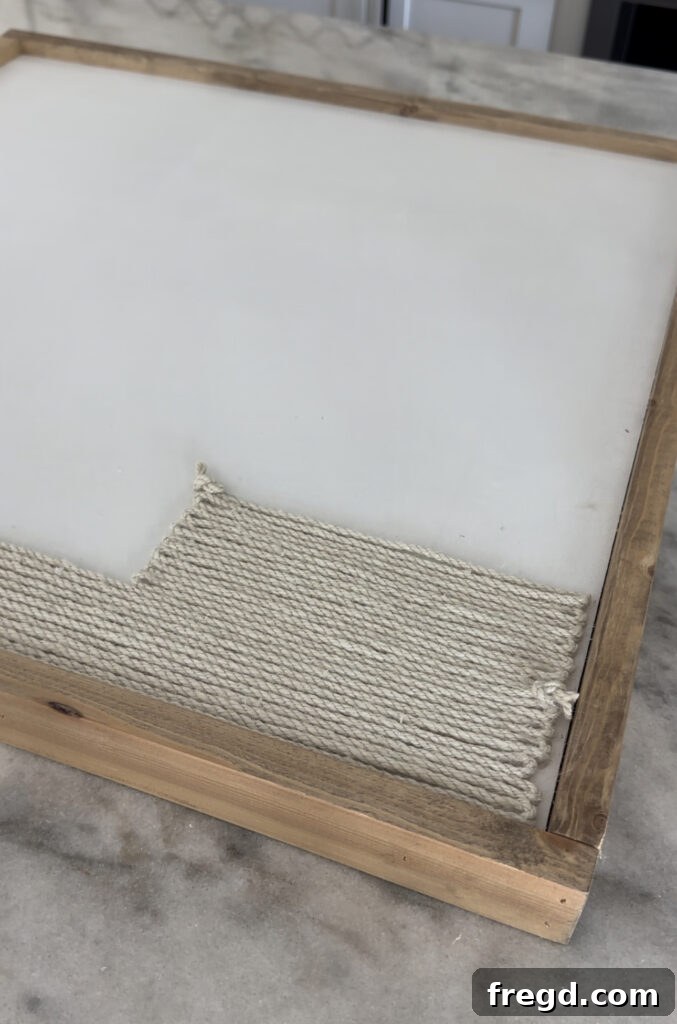Nature's Eternal Canvas 19 Continuing the segmented jute rope design on the right side of the frame